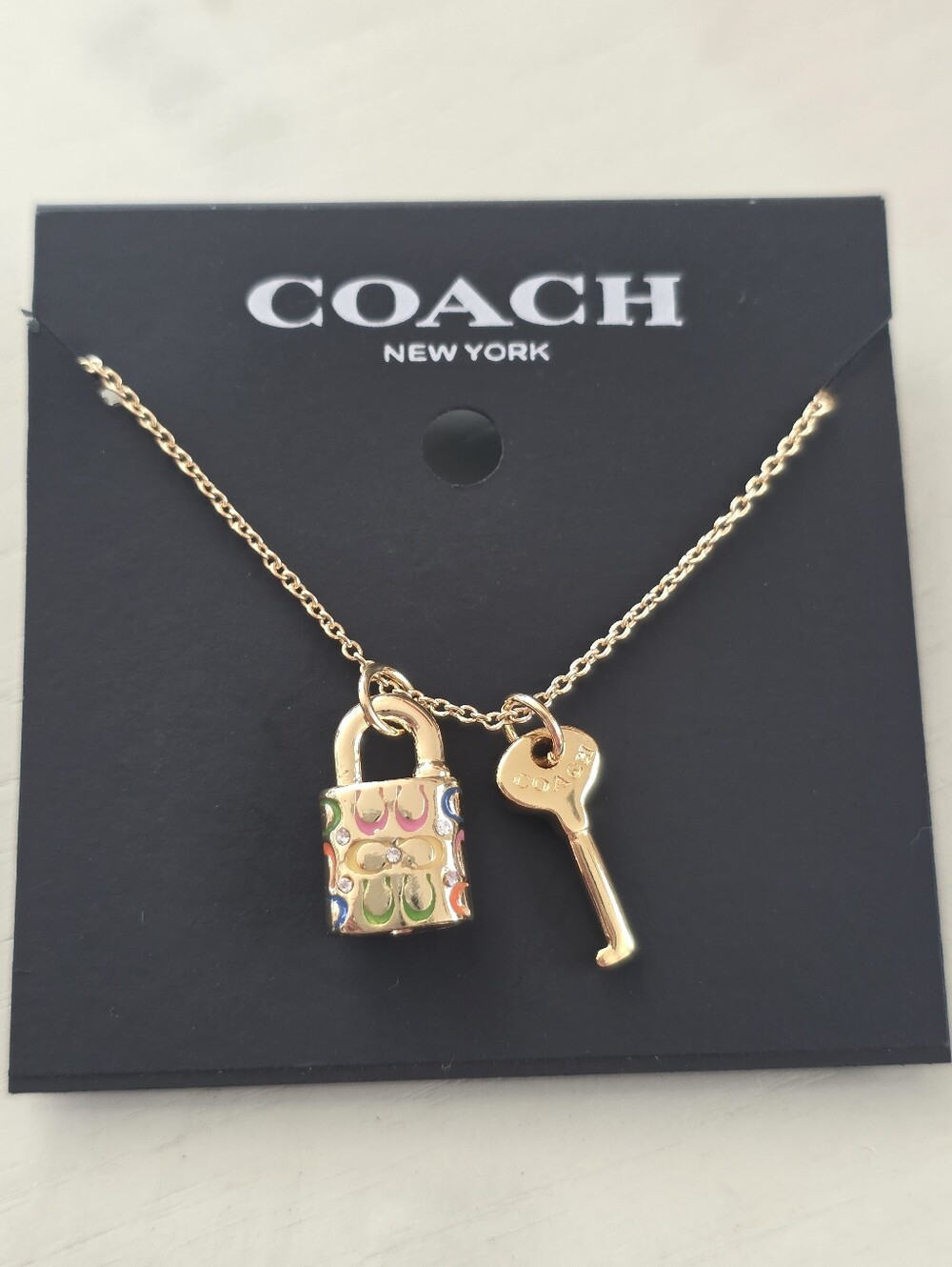 Coach gold necklace with lock and key charm Multicolor Gold NWT